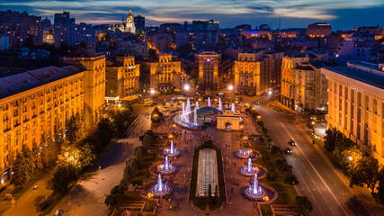 Fototapeta na wymiar Maidan Nezalezhnosti (Independence Square) in Kyiv (Kiev) Ukraine. main square of the capital with fountains and architecture. Tourist attraction must visit place of revolution. Aerial drone photo 