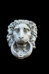 gypsum sculpture lion head to decorate the facade of the building isolated on a black background