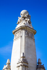 It's Miguel de Cervantes Saavedra monument on the Plaza de Espana, Madrid, Spain. Cervantes was a Spanish novelist, poet and playwright