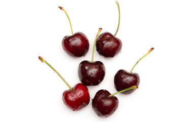 Fresh cherries on a white background