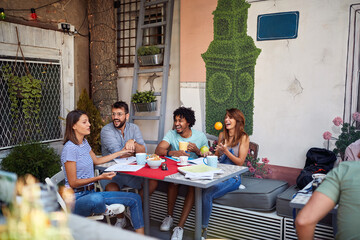 Group of students enjoys a break of study