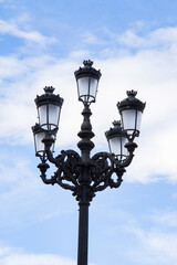 Fototapeta na wymiar It's Lamp post near the Royal Palace, Madrid, Spain