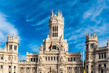 Fototapeta na wymiar It's Cibeles Palace (Palacio de Cibeles), Madrid, Spain. It was home to the Postal and Telegraphic Museum until 2007. Spanish Property of Cultural Interest