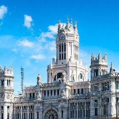 Fototapeta na wymiar It's Cibeles Palace (Palacio de Cibeles), Madrid, Spain. It was home to the Postal and Telegraphic Museum until 2007. Spanish Property of Cultural Interest