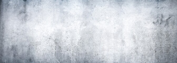 Texture of a grungy white concrete wall as a background or wallpaper