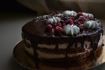 chocolate cake with fruit and meringue