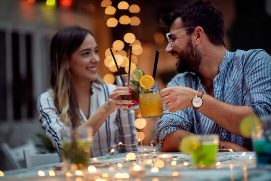 Young lovely couple making a toast