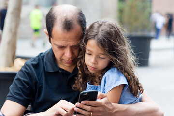 young couple using smartphone