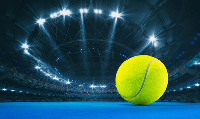 Magnificent tennis arena with a tennis ball on a blue artificial floor with spectators on the grandstand. Professional world sport 3D illustration background.