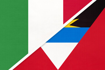 Naklejka premium Italy and Antigua and Barbuda, symbol of two national flags from textile. Championship between two countries.
