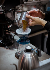 Fototapeta na wymiar Fresh coffee percolating into glass