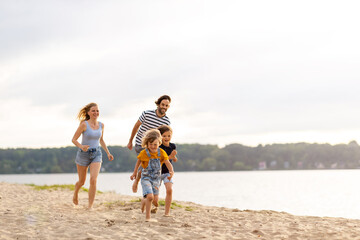 Young family enjoying time at the beach