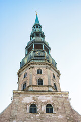 Obraz premium It's St. Peter's Church, in the Old Town of Riga. Riga's historical centre is a UNESCO World Heritage Site