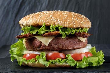 A classic big hamburger with crispy bacon