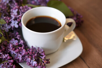 Obraz na płótnie Canvas cup of coffee with lilac