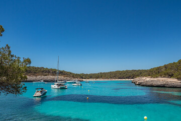 yachts and cruisers in the bay at cala mondrago mallorca