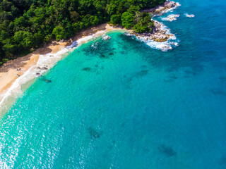 Top aerial view beautiful white sand beach with turquoise sea water and palm trees