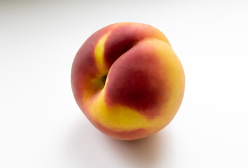 Juicy peach on a white background. 