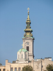 Obraz premium Saint Michael Cathedral, also known as Saborna Crkva, with its iconic clocktower seen from a street of Stari Grad district. It is one of the main landmarks of Belgrade, Serbia.