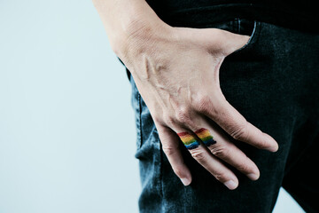 rainbow flag in the hand of a person
