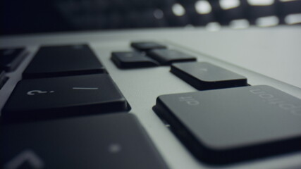 Laptop computer keyboard with black keys. Buttons of laptop keyboard in detail