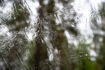 background rain through car glass in dark colors