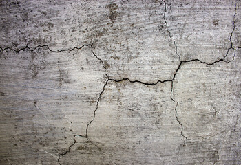 Old stone wall with cracks background