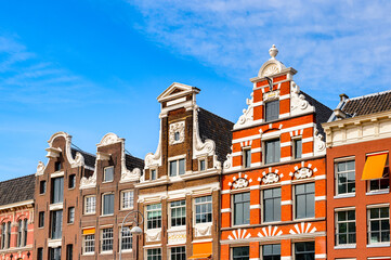 Fototapeta na wymiar It's Typical bend houses in AMsterdam, Netherlands