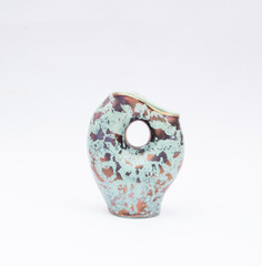 Ceramic vase with turquoise pattern isolated