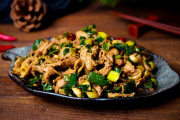 Chinese stir fried pork with green garlic
