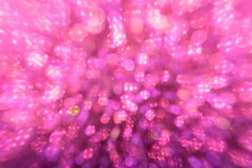 Abstract pink background with bubbles and sparkling glittering Valentines day, event lights romantic backdrop. Blurred abstract holiday background