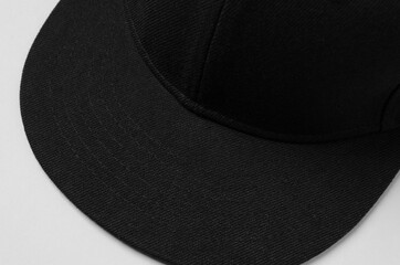 Black snapback cap mockup closeup.