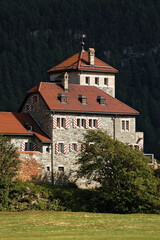 Fototapeta na wymiar Ancient Castle Crap da Sass, on the coast of the Silvaplana Lake (Silvaplanersee), Silvaplana village, Saint Moritz. Engadin valley, Graubunden canton, Maloja region, Switzerland, Europe