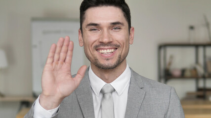 Online Video Chat by Excited Businessman