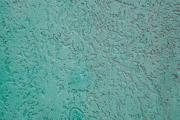 texture background in turquoise color with notches