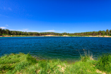 The picturesque lake in Toksovo village, a popular summer holiday destination, Leningrad region, Russia