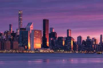 Fototapeta na wymiar View on Midtown Skyline at sunrise with long exposure