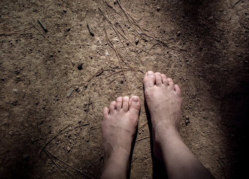 barefoot on the sand - walking bare foot in the nature - connection to the earth - simplicity human - the strength of being humble