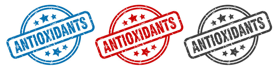antioxidants stamp. antioxidants round isolated sign. antioxidants label set