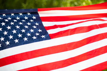 Fototapeta premium woman holding US flag independence day