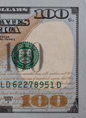 fragment of 100 dollar bill