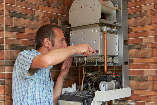 To Repair A Gas Boiler,call A Master To Repair A Gas Boiler House