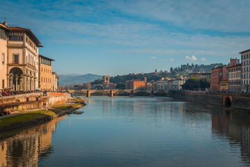 FLORENCE, TUSCANY / ITALY - DECEMBER 27 2019: Arno river photo in Florence city