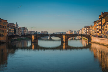 FLORENCE, TUSCANY / ITALY - DECEMBER 27 2019: Arno river photo in Florence city