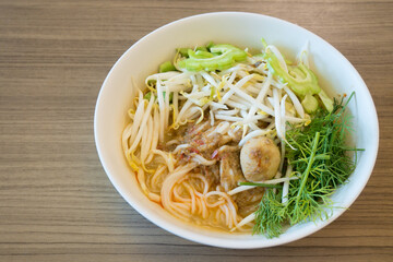 thai rice vermicelli name "Khanom chin" thai food with curry and vegetable