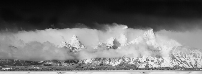 Tetons in the Clouds - The Grand Tetons slowly appear as the cloud cover melts away. Grand Tetons National Park, Wyoming.
