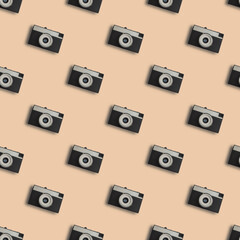 Retro camera seamless pattern in beige color