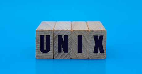 UNIX - word on wooden blocks on a blue background