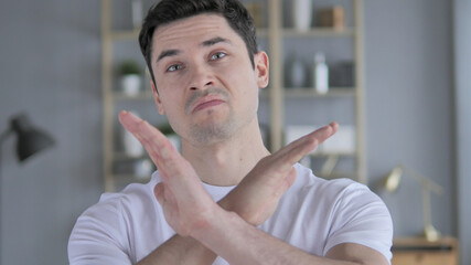 Rejecting, Disliking Gesture by Young Man