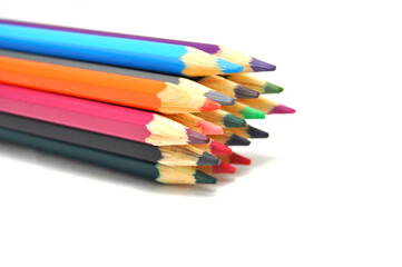  Pencils сolored on a white background close up. Drawing, art